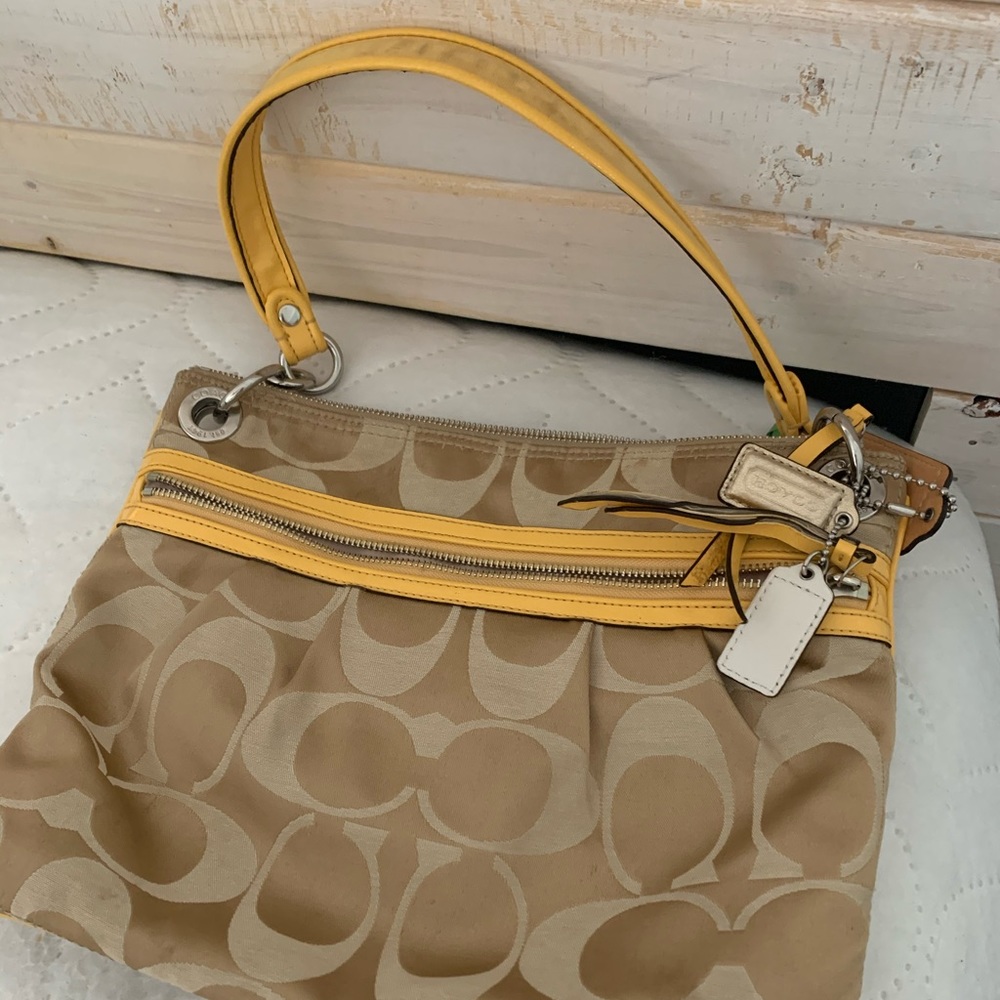 Tan and gold Coach purse